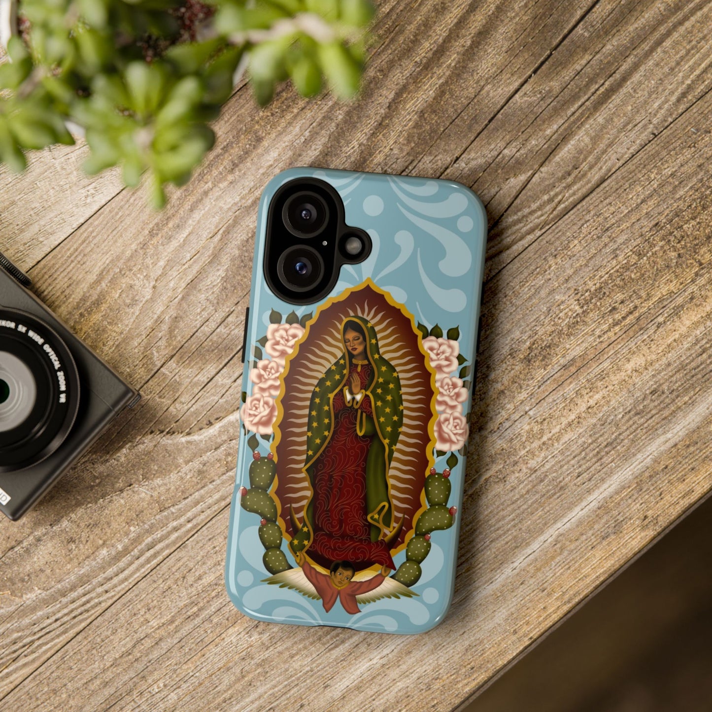 Virgen de Guadalupe iPhone case with light blue Talavera background