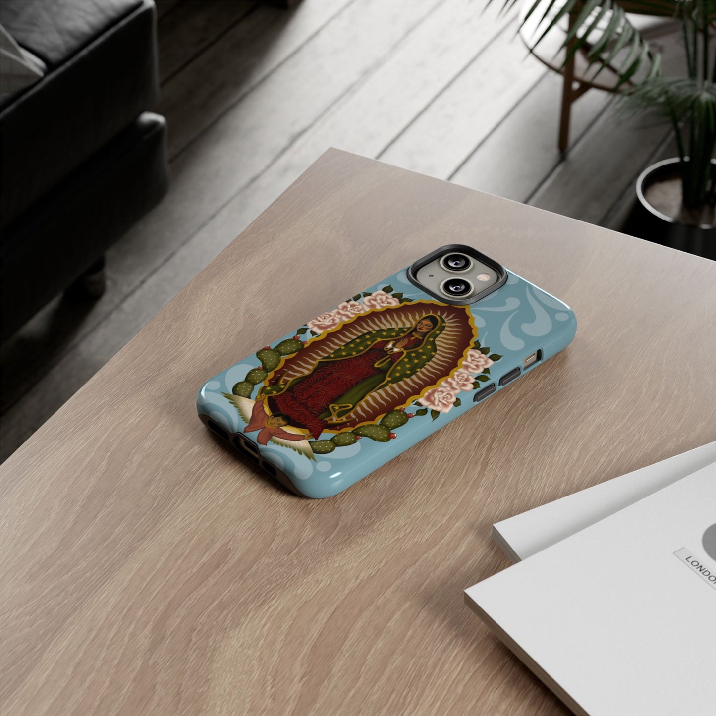 Virgen de Guadalupe iPhone case with light blue Talavera background