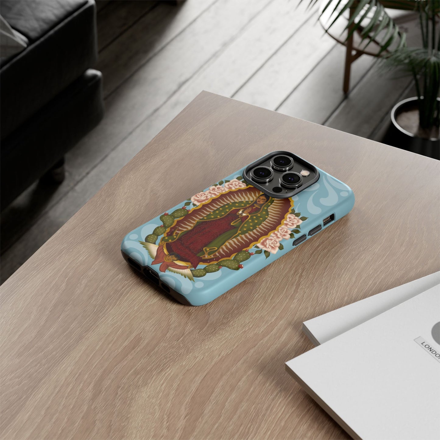 Virgen de Guadalupe iPhone case with light blue Talavera background
