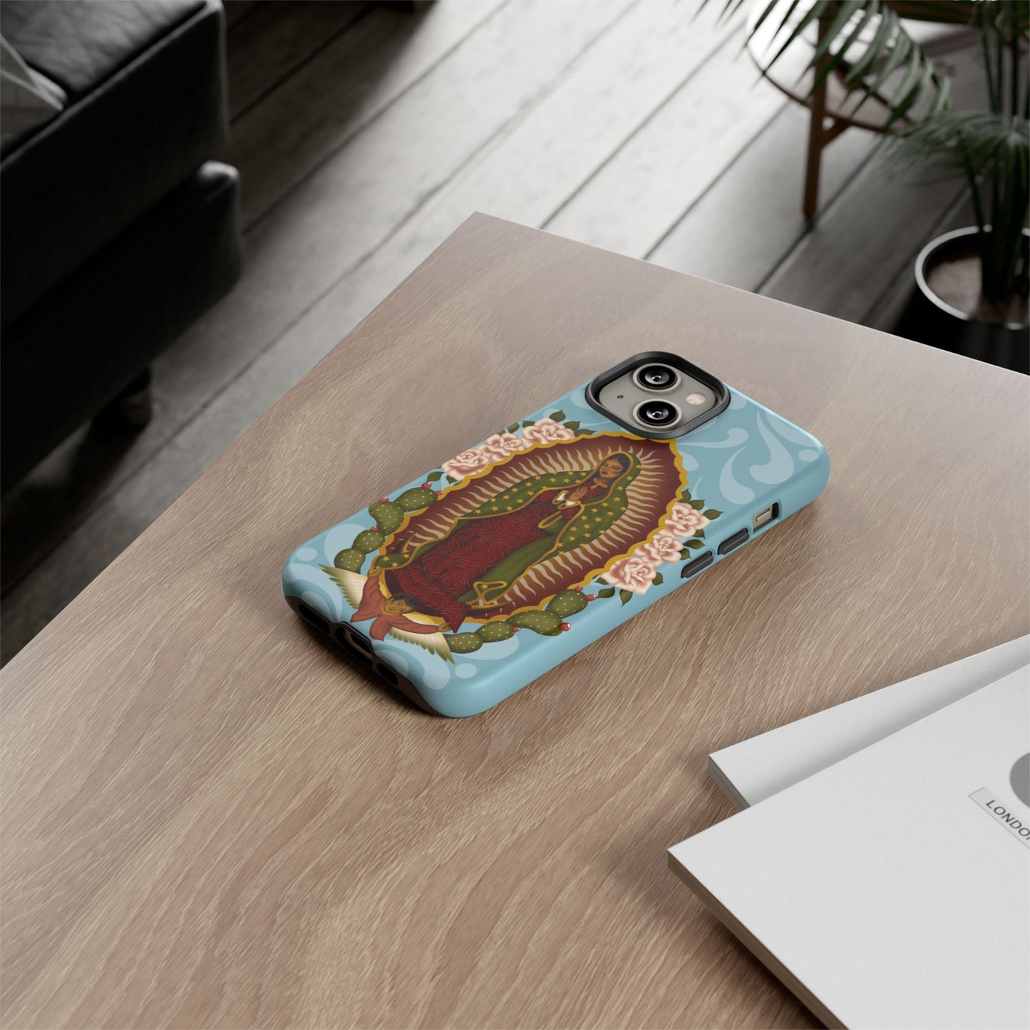 Virgen de Guadalupe iPhone case with light blue Talavera background