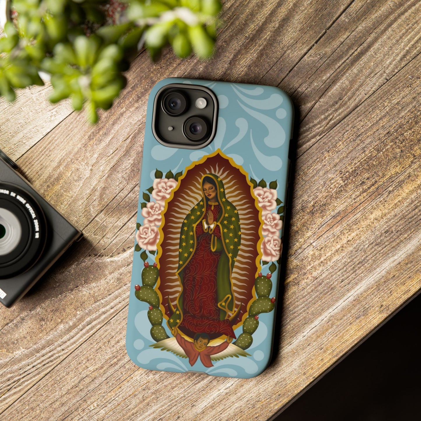 Virgen de Guadalupe iPhone case with light blue Talavera background