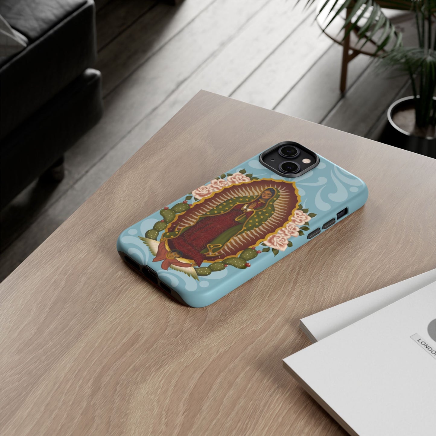 Virgen de Guadalupe iPhone case with light blue Talavera background