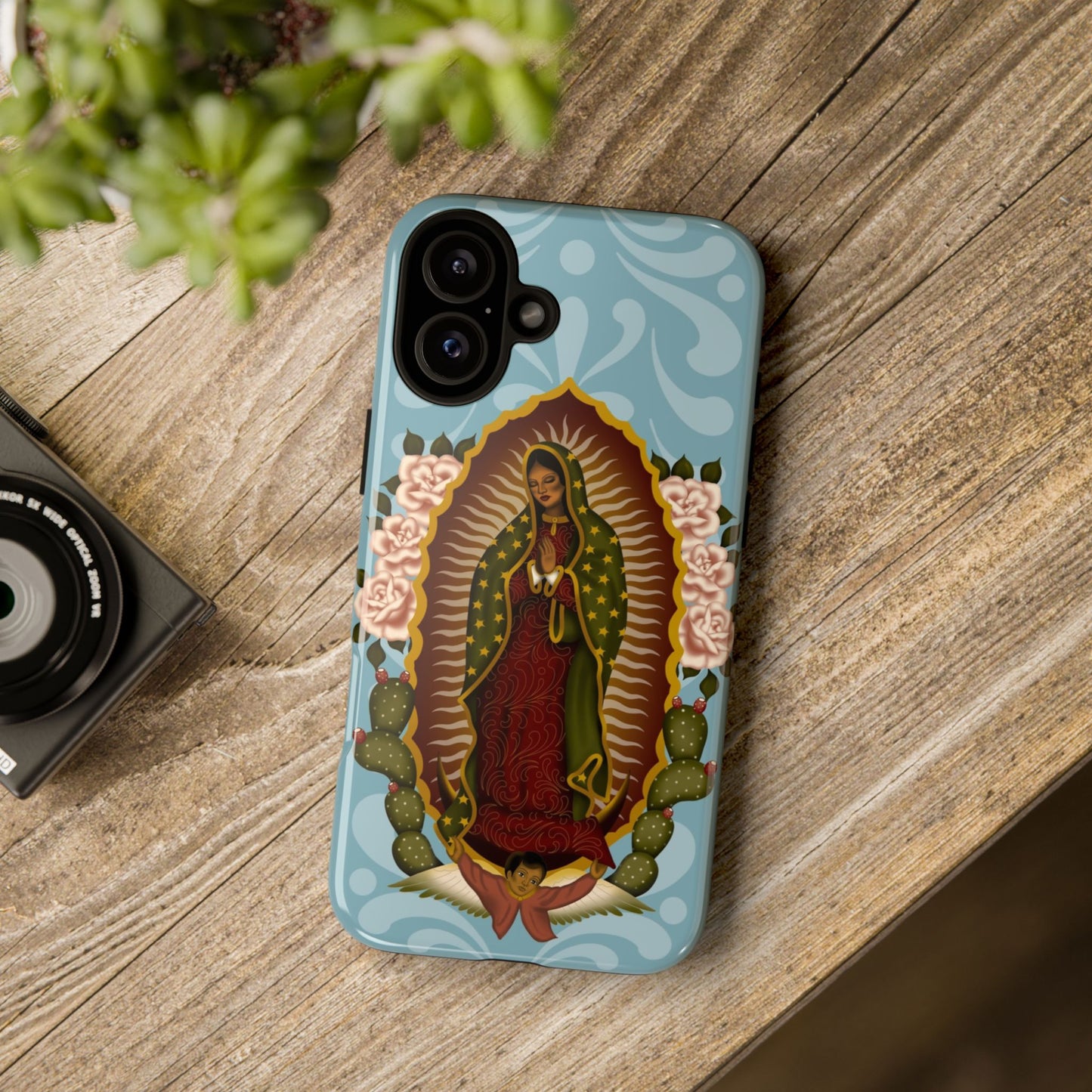 Virgen de Guadalupe iPhone case with light blue Talavera background
