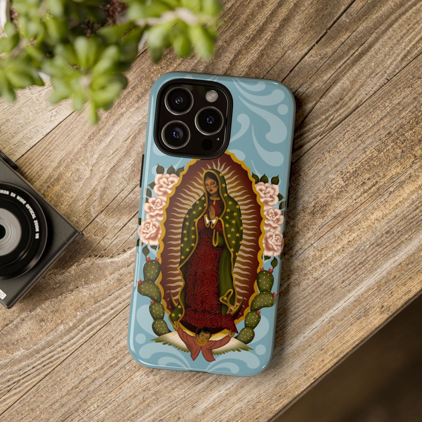 Virgen de Guadalupe iPhone case with light blue Talavera background
