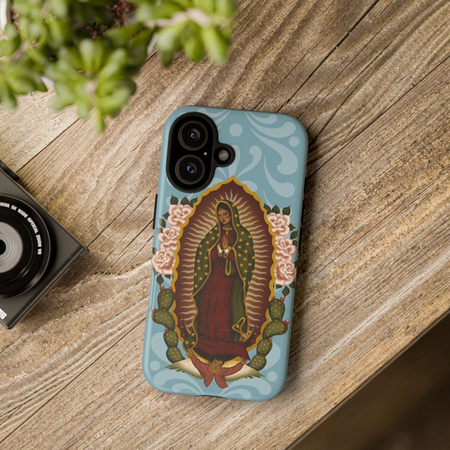 Virgen de Guadalupe iPhone case with light blue Talavera background