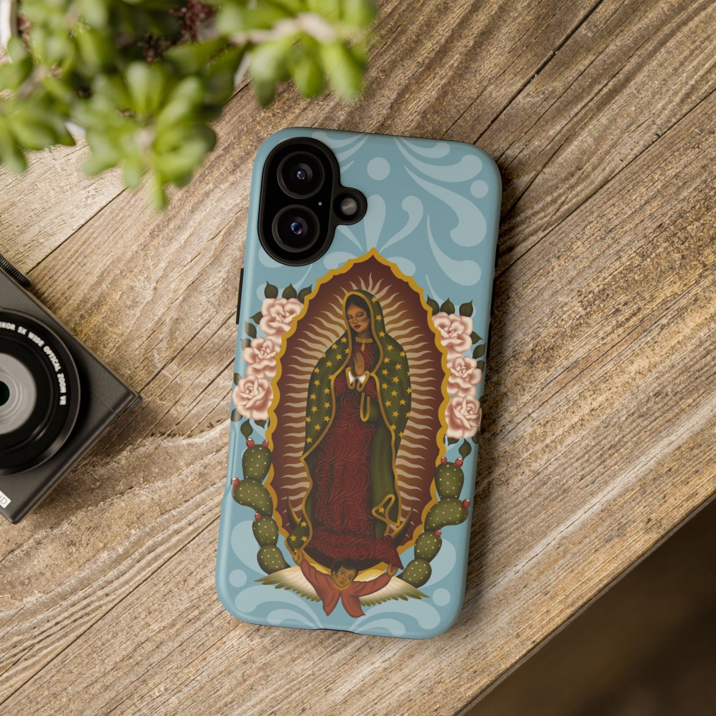 Virgen de Guadalupe iPhone case with light blue Talavera background
