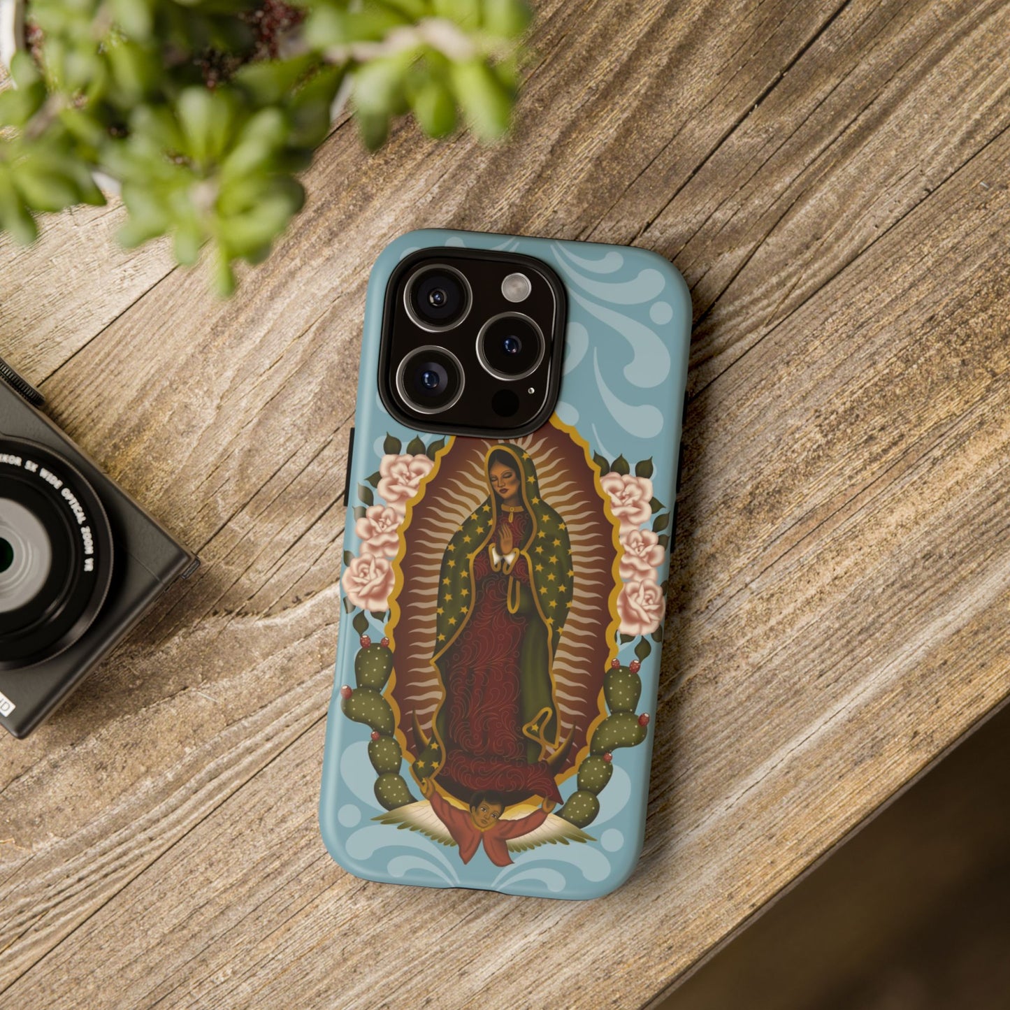 Virgen de Guadalupe iPhone case with light blue Talavera background