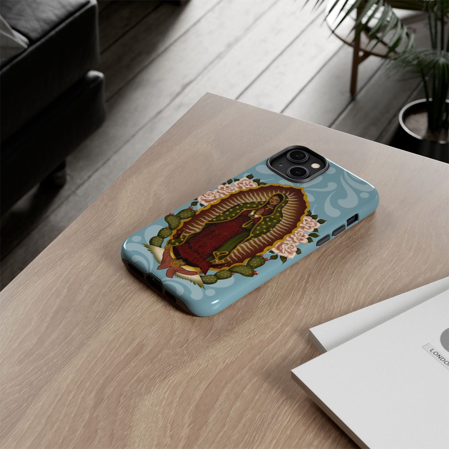 Virgen de Guadalupe iPhone case with light blue Talavera background
