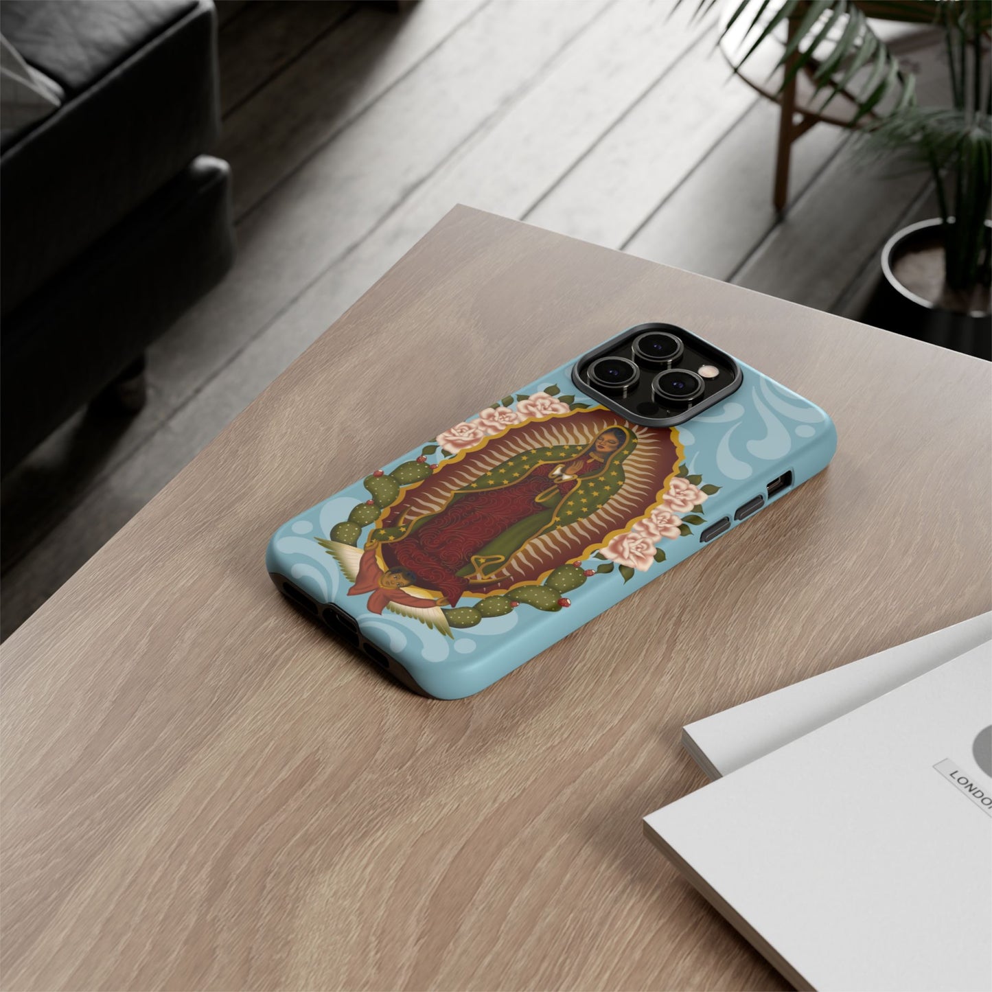 Virgen de Guadalupe iPhone case with light blue Talavera background