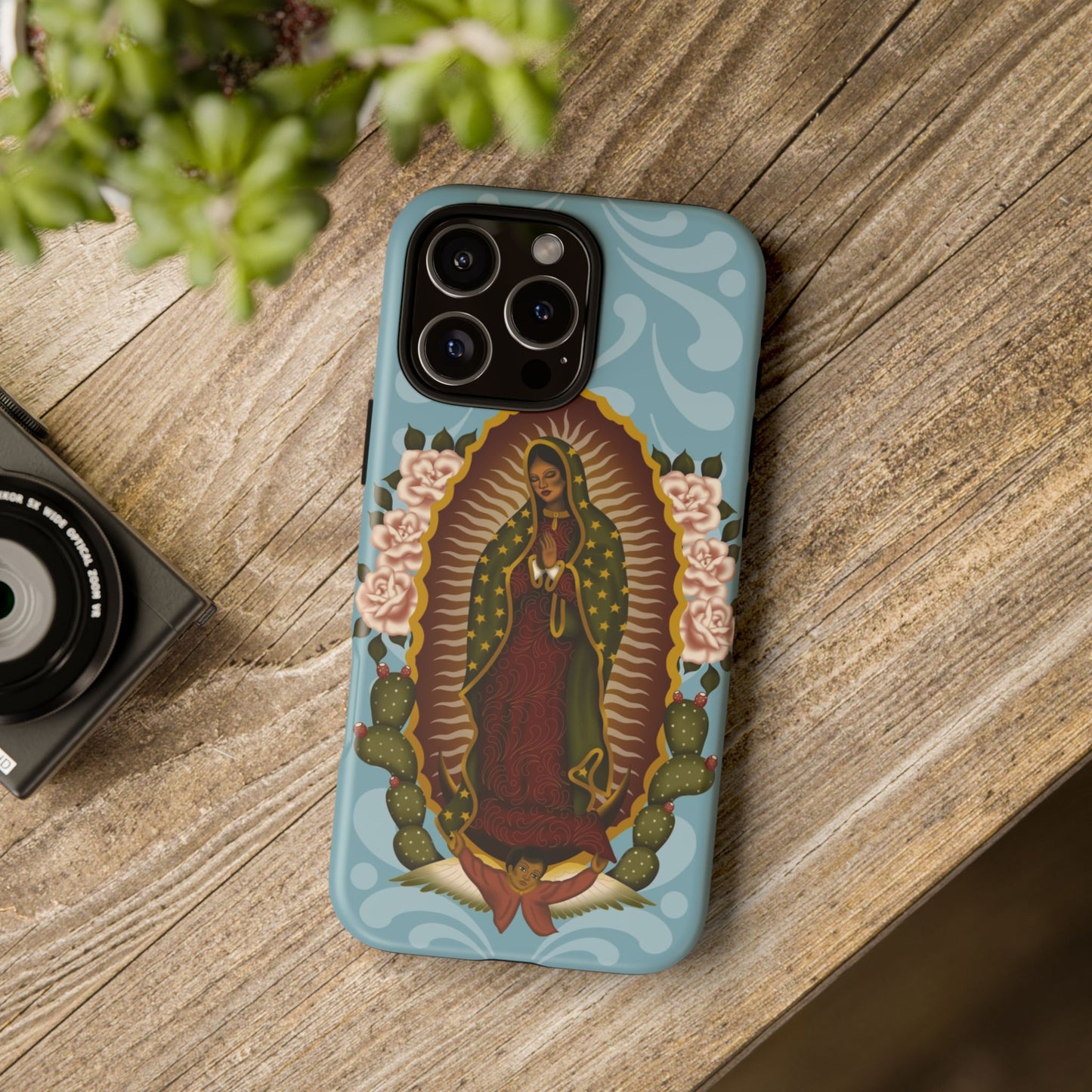 Virgen de Guadalupe iPhone case with light blue Talavera background