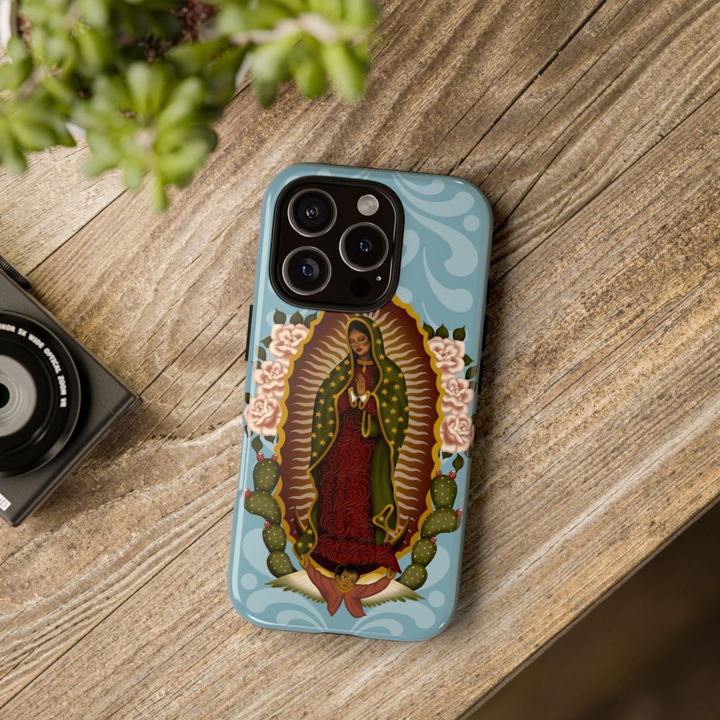Virgen de Guadalupe iPhone case with light blue Talavera background